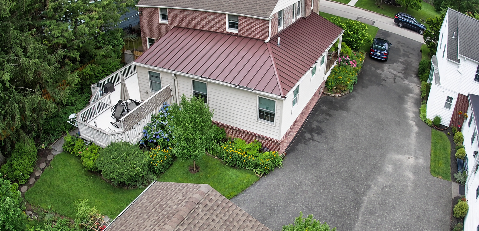 House with newly installed metal roofing